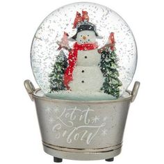 a snow globe with a snowman in it