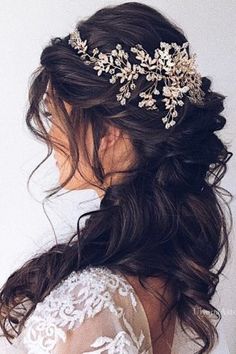 a woman wearing a bridal hair comb