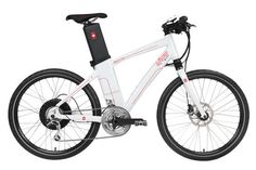 the electric bike is white and has red trimmings on the front wheel, with black spokes