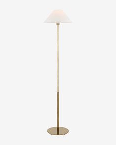 a floor lamp with a white shade on the top and a gold base, against a white background