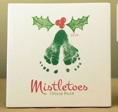 a christmas ornament with the words mistle toes and holly leaves on it