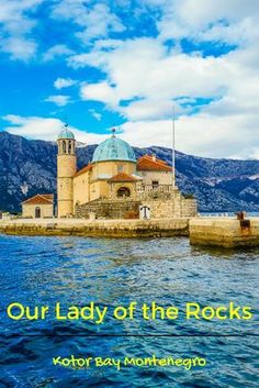 an island with mountains in the background and text that reads our lady of the rocks