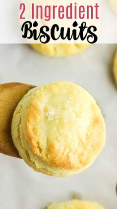 two ingredient biscuits on a wooden spoon with the text 2 ingredient biscuits above them