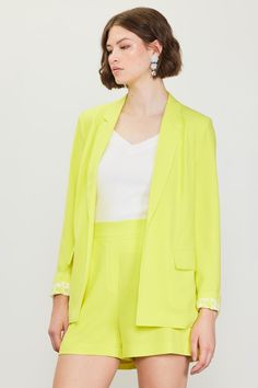 The Top Notch Boyfriend Blazer in yellow?! A statement piece for spring. This fit? A CLASSIC. It has so many great details like working pockets, straight sleeves and a notched collar. Blazers are always sooo chic and this one has the perfect cool girl touch. -Relaxed fit blazer-- straight,, easy fit-Longer length hits at just the right spot-Curved lapel-Open style front-- tres chic-Small shoulder pads for structure-Full length-Fully lined and delicious quality XSmall: 2-4, Small: 4-6, Medium: 8- Spring Single Breasted Blazer For Work, Spring Single-breasted Blazer For Workwear, Single-breasted Blazer For Spring Workwear, Single-breasted Spring Workwear Blazer, Single Breasted Blazer For Spring Workwear, Spring Blazer With Lapel Collar For Work, Spring Workwear Blazer With Lapel Collar, Spring Business Casual Blazer In Solid Color, Spring Business Casual Blazer With Pockets