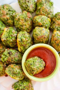 broccoli balls with ketchup on a plate