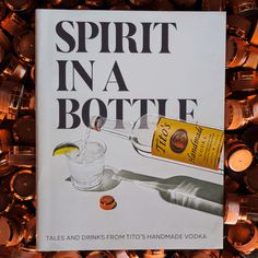 a book titled spirit in a bottle surrounded by bottles