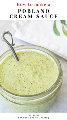 a jar filled with cream sauce sitting on top of a table