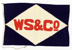 the w & co logo is displayed on a piece of cloth