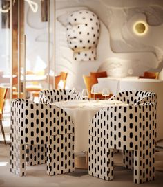 the tables are decorated with black and white polka dots