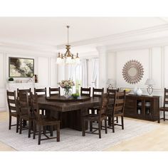 a dining room table and chairs in front of a window