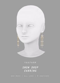 a white mannequin head with earrings on it