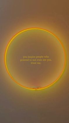 a yellow circle with a quote on it