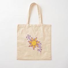 a tote bag with an image of the sun on it