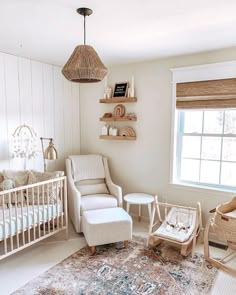 a baby's room with a crib and rocking chair