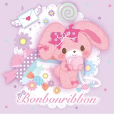 a pink bunny with a bow on its head