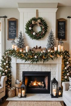 a living room decorated for christmas with candles and wreaths on the fireplace mantel