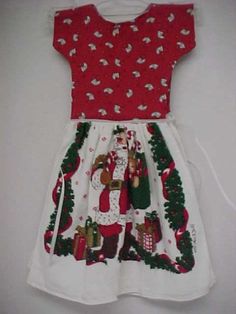 a red and white dress with santa clause on it