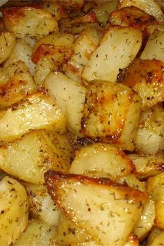 roasted potatoes on a plate with seasoning