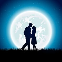 a couple kissing in front of the moon at night stock photo - 957982