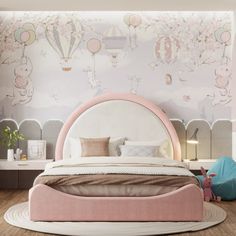 a bedroom with pink and white decor on the walls, flooring and bedding