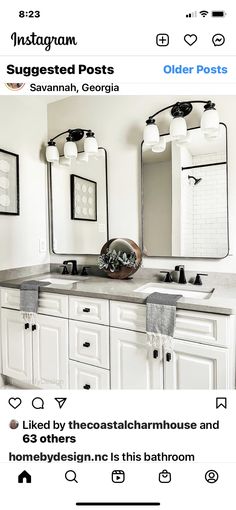 a bathroom with two sinks, mirrors and lights on the wall above it is featured in instagram