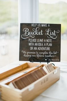 a wooden sign that says help us make a bucket list please leave a note with an idea, a plan or an adventure