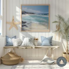 a white room with blue and white pillows on a bench next to a potted plant