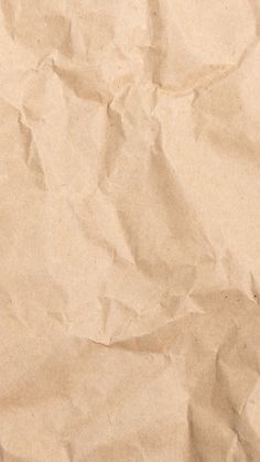 a piece of brown paper that has been wrinkled