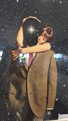 a man and woman embracing each other in front of the night sky with stars behind them