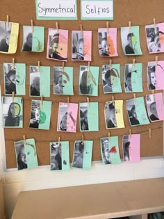 a bulletin board with pictures pinned to clothes pins and magnets attached to the pegs