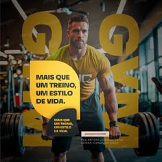 a man holding a barbell in front of a gym poster with the words,