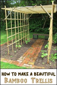 a garden area with a trellis and brick walkway