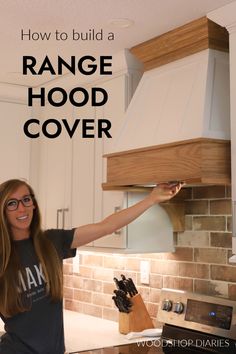 a woman holding up a range hood over her kitchen counter top with the words how to build a range hood cover