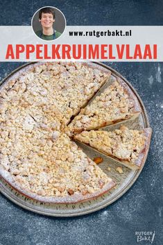 an apple crumbl cake on a plate with the words applescrumbl written above it