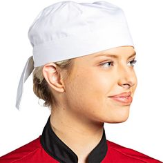 a woman wearing a chef's hat and smiling