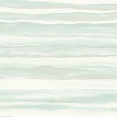 an ocean themed wallpaper with white and light blue waves on the top right side