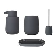 the bathroom accessories are all grey and include soap dispenser, toothbrush holder, toilet brush, cup with lid