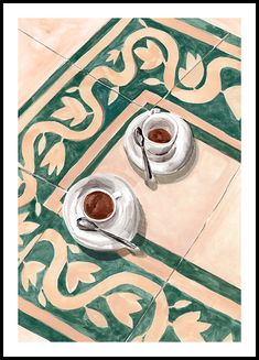 two cups of coffee sit on a tiled floor in front of a wooden framed frame