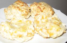 some biscuits are on a white plate and ready to be eaten