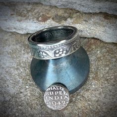 Lovely Indian vintage half rupee coin ring in silver. This is a lovely coin and makes a beautiful ring, love working with these coins when I can get them. Due to the nature of vintage coins , any blemishes from its life are part of the design.  All my jewellery is hand made by me, using traditional tools, then hand finished again by me.  This makes every piece unique and completely one of a kind. This makes for a truly personal item and you can be safe in the knowledge  that no one else has one exactly like it.  A perfect gift to be treasured. I protect all finished items with Renaissance Microcrystalline Wax Polish, which was developed by the British Museum to protect their artefacts. Coin Ring, Be Safe, British Museum, Beautiful Ring, Ring Handmade, Rings Statement, Handmade Ring, Vintage Silver, Beautiful Rings