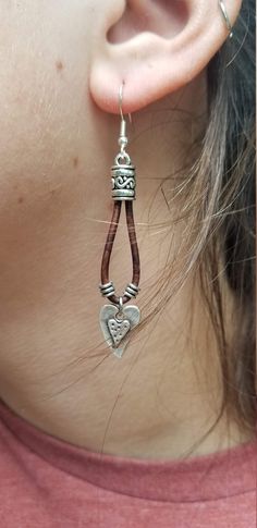 You will love these leather earrings with silver plated charm and beads. Choose either Ottoman coins or hearts and dark brown or light brown leather. Choose silver plated or sterling silver earring wires which are attached to silver plated cording ends. They hang about 2 inches long with the charm. Business Earrings, Leather Cord Jewelry, Leather Necklaces, Leather Jewels, Diy Jewelry Earrings, Earring Wires