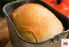 a loaf of bread in a metal pan