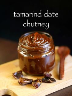 tamarind date chutney in a jar with cinnamon sticks