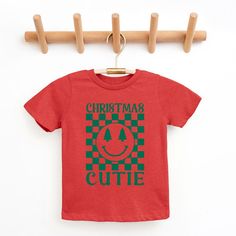 Looking for a cute tee for your kids? We have the perfect Christmas Cutie Checkered graphic tee addition to their closet! Also available in youth tees. Pokemon Halloween, Minnie Mouse Girl, The Perfect Christmas, Kids Clothes Boys, Toddler Boy Outfits, Top Graphic Tees, Toddler Tees, Boys Long Sleeve, Fabric Names