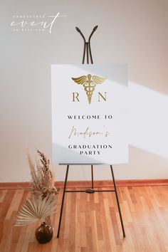 a welcome sign with a stethoscope on it in front of a wooden floor