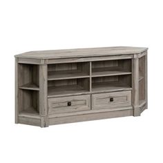 an entertainment center with drawers and shelves on the bottom, in grey wash wood finish