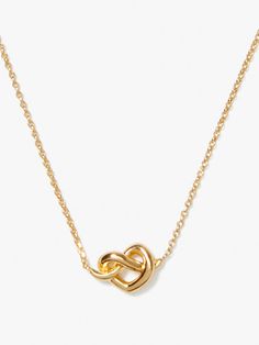 we designed this loves me knot necklace as an update to our best-selling sailor's knot. if you take a second look, you might notice the knotted pendant resembles a heart. it's a nod to one of our favorite (and sweetest) emblems. | Kate Spade Loves Me Knot Mini Pendant, Gold Invisible String, Sailor Knots, Preppy Jewelry, Fairy Aesthetic, Jewelry Knots, Trainer Heels, Bracelet Online, Flower Fairy, Trainer Boots