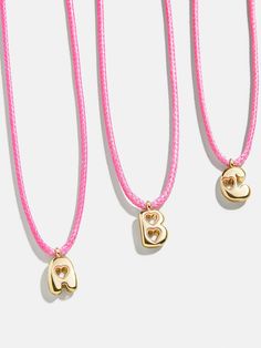 Give your little one a present that’s uniquely theirs with the Pretty in Pink Kids’ Initial Necklace. Personalized with their initial in gold, it’ll be so cute, they won’t ever want to take it off. Please note: intended for children 3+. Packaging May Vary. Kids Jewelry Gold, Primark Kids, Personalized Placemats, Ice Cream Kids, Bracelets For Kids, Ballerina Kids, Toddler Jewelry, Donuts Earrings, Unicorn Earrings