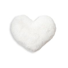 a white heart shaped pillow on a white background