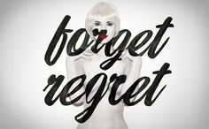 a woman with white hair and black lettering that reads forgetr repeats on her face